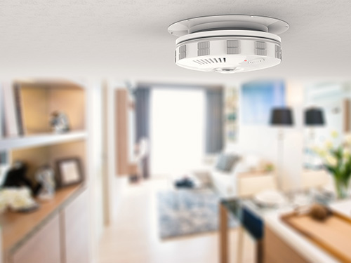 A smoke detector installation saves lives in a fire emergency.